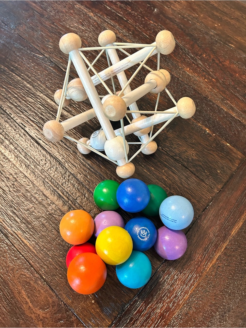 Manhattan Toy Skwish Natural Rattle and Teether Toy and Colorful Wood Beads Toy